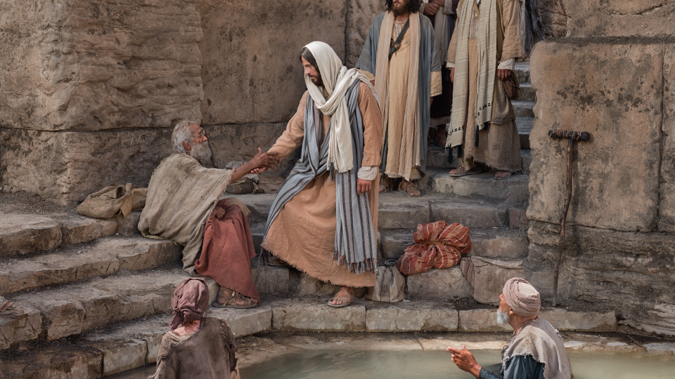 The Savior ministering to people near a stone stairway